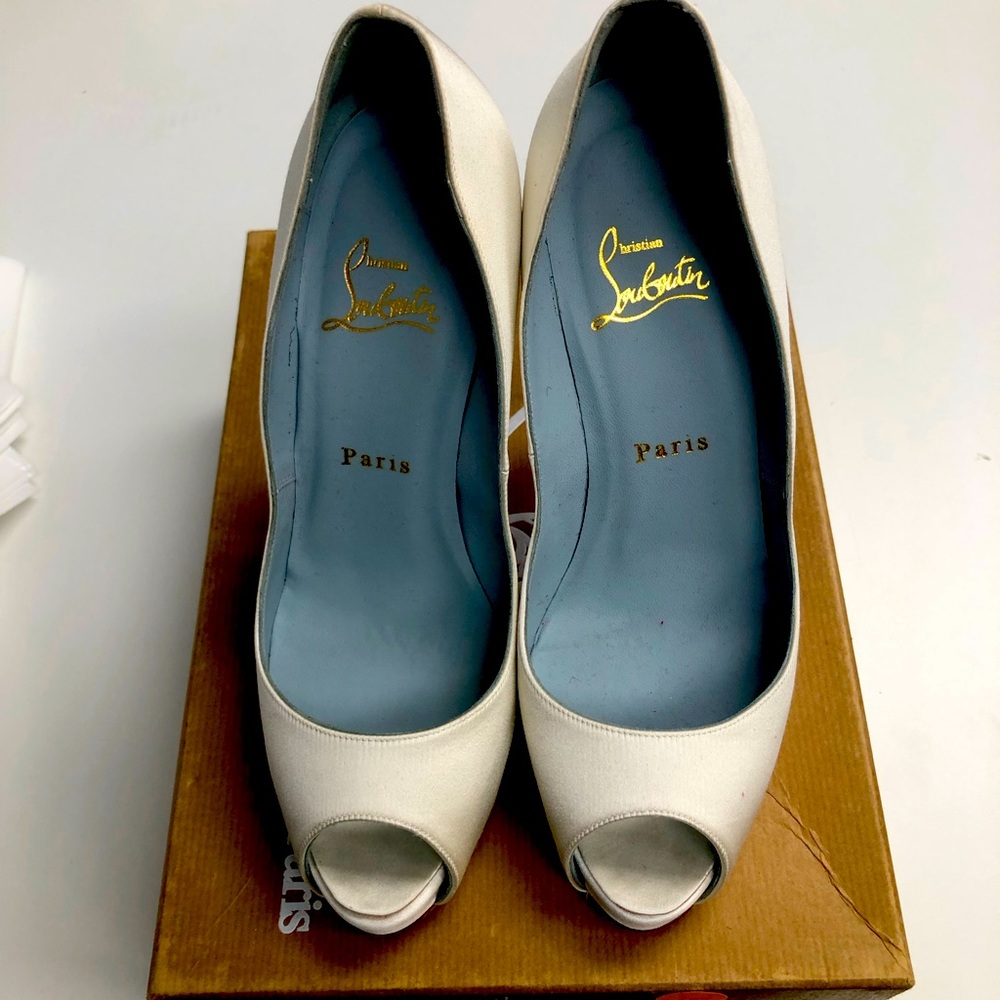 Christian Louboutin shoes. Worn once for my wedding. Bought in the U.K.
